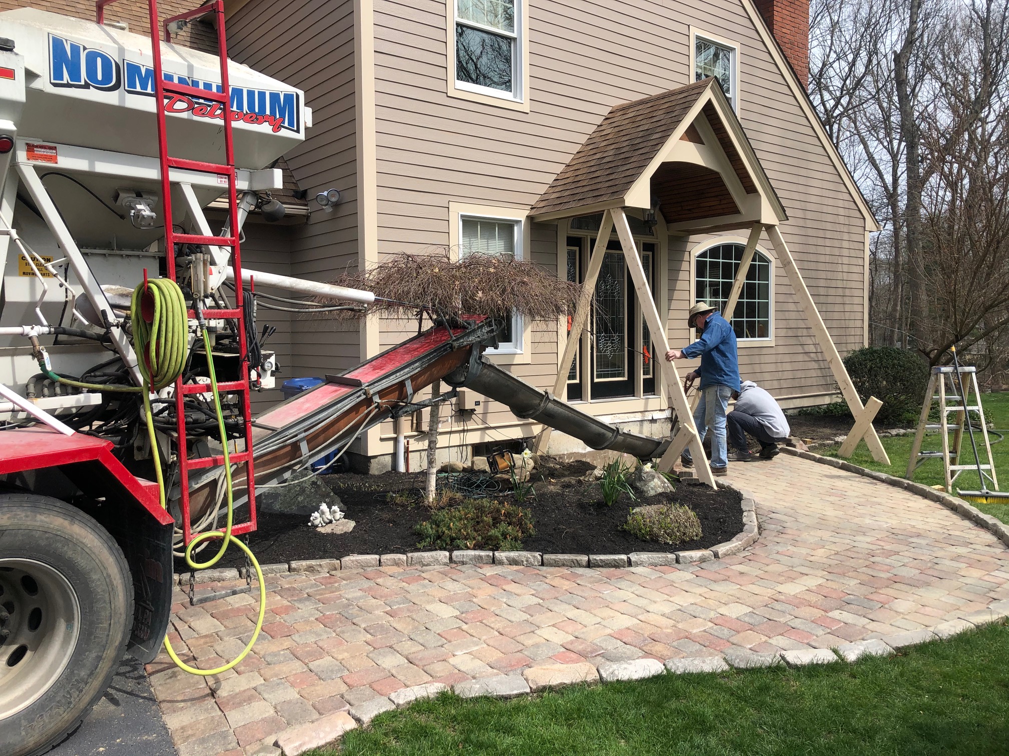 Residential small load concrete delivery service ri for patios sidewalks floors and retaining walls